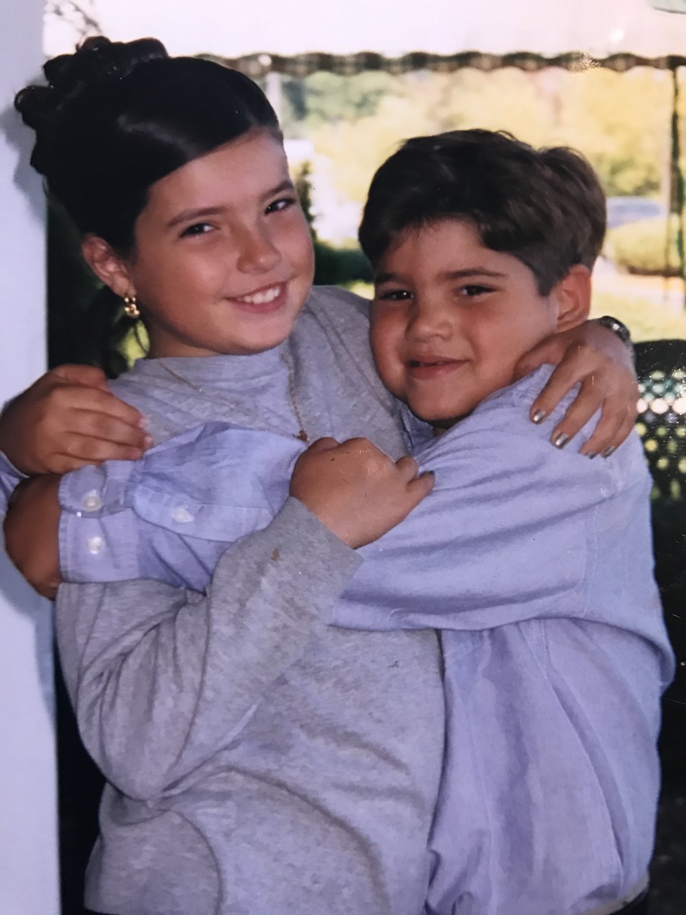Jesse and Jordan hugging as kids