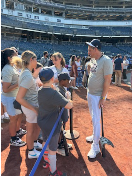 Manager Aaron Boone, from Yankees, with campers