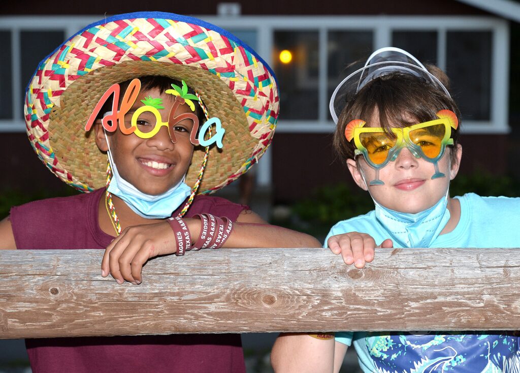 Two boys in silly sunglasses