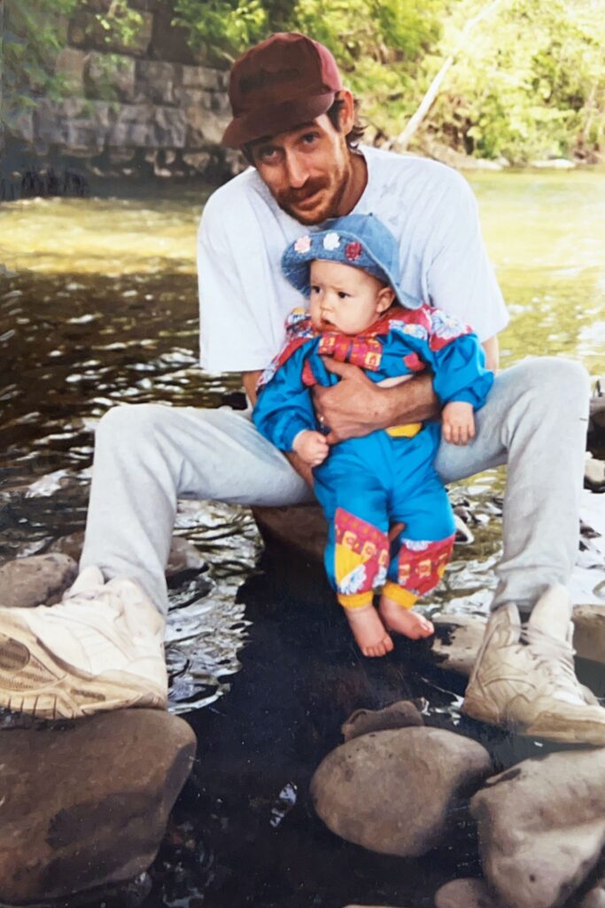 Author as baby with her father