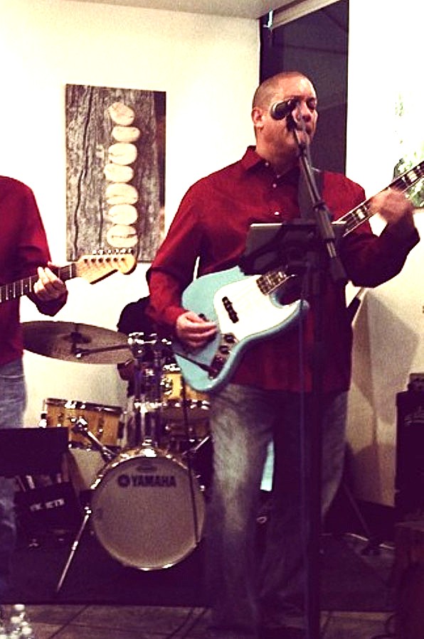 Sarafina's dad playing guitar